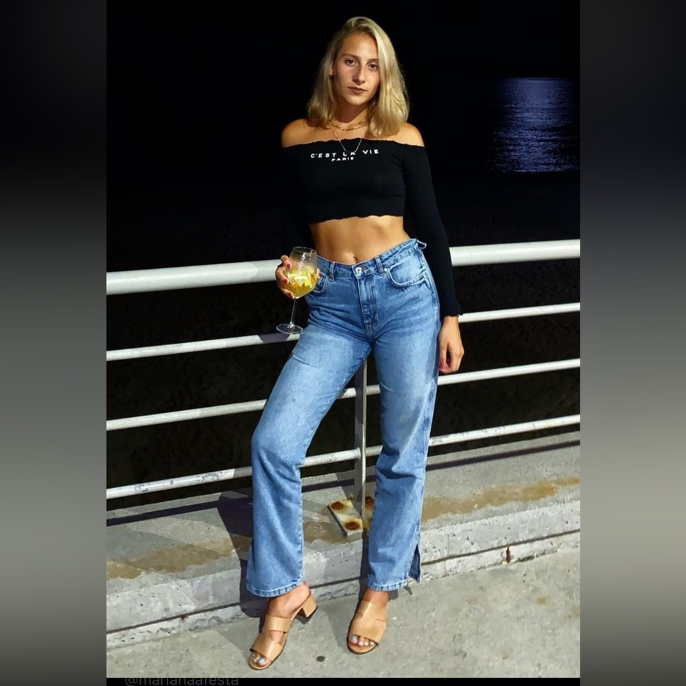 Flare jeans with an adjustable waist button sewn in.